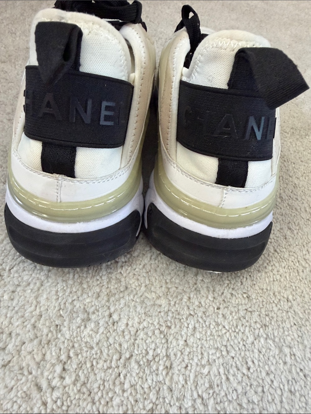 CHANEL Women’s Sneakers in White, Black and Cream